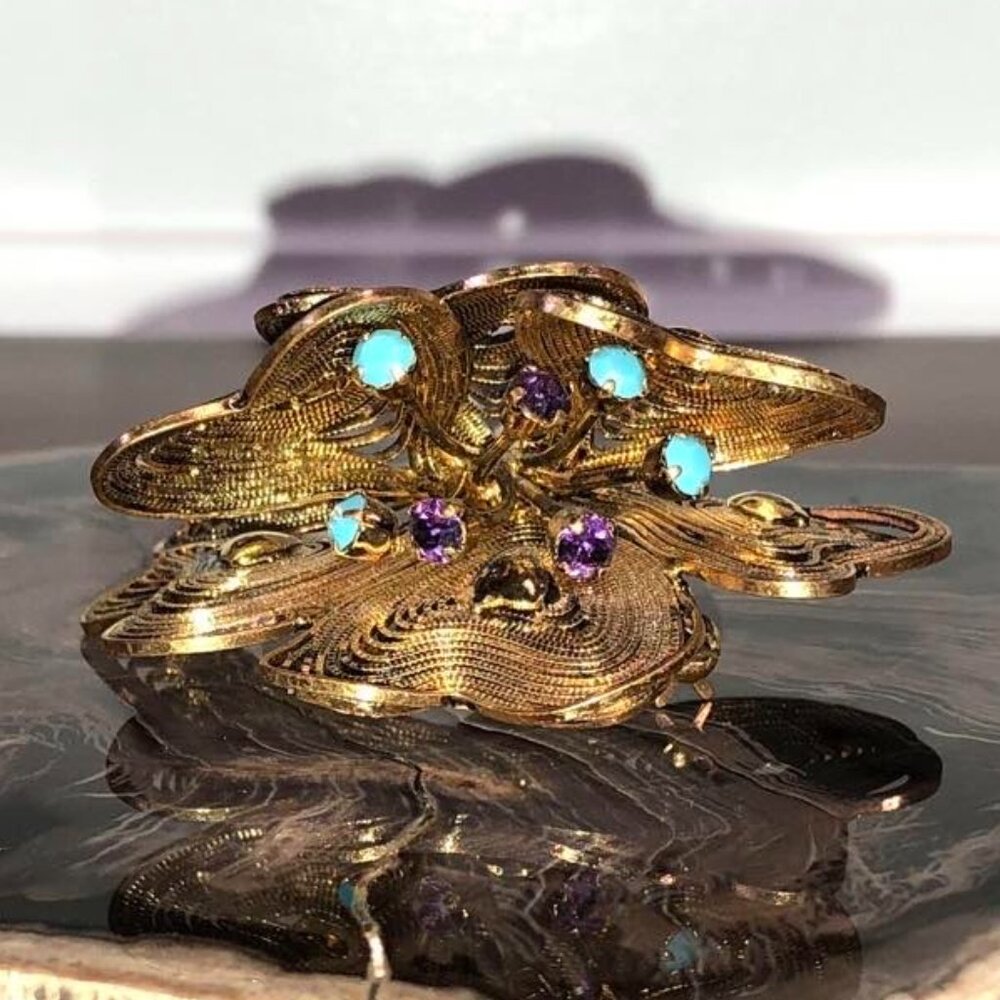 Vintage turquoise and amethyst gold tone filament floral brooch